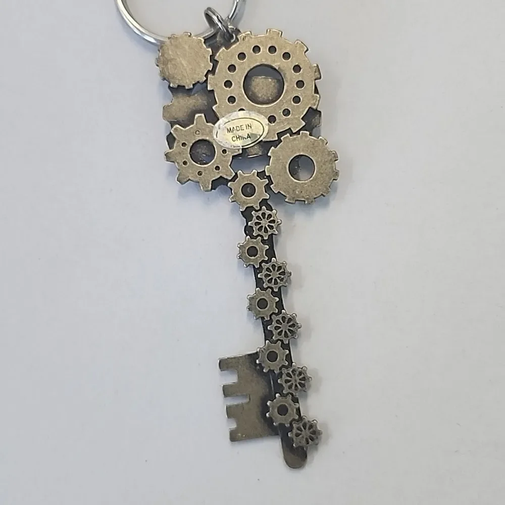 WORLDS OF FUN KEYCHAIN KEYRING HAUNT 2017 AMUSEMENT PARK RIDES STEAMPUNK